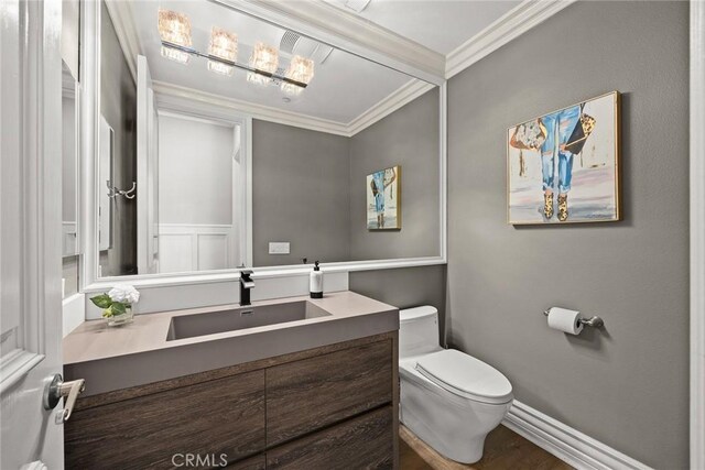 67 W Wistaria Ave, Arcadia, CA 91007 - half bath featuring crown molding, toilet, and vanity