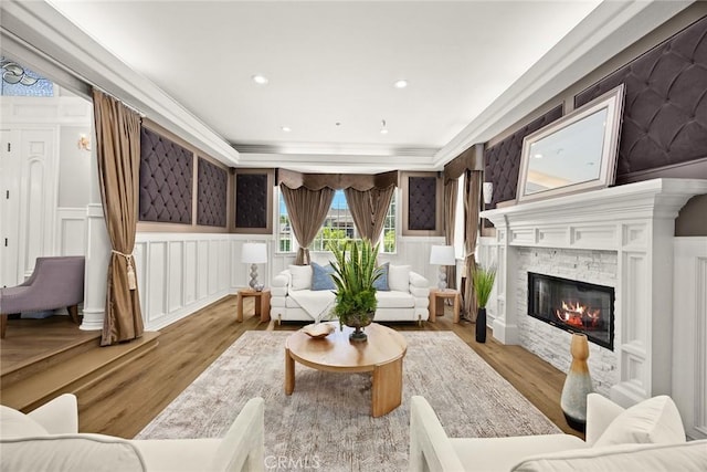 67 W Wistaria Ave, Arcadia, CA 91007 - living room featuring a decorative wall, wood finished floors, wainscoting, a fireplace, and recessed lighting