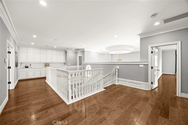 67 W Wistaria Ave, Arcadia, CA 91007 - corridor featuring an upstairs landing, ornamental molding, recessed lighting, baseboards, and wood finished floors