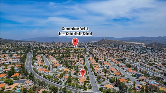 drone / aerial view with a mountain view and a residential view