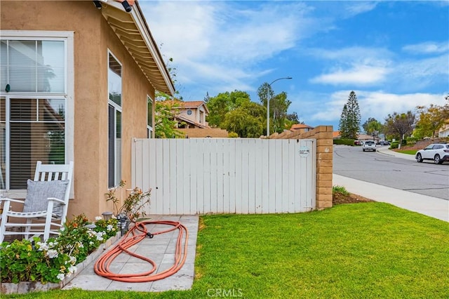 view of yard with fence