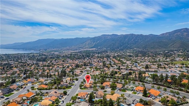 aerial view with a residential view and a water and mountain view