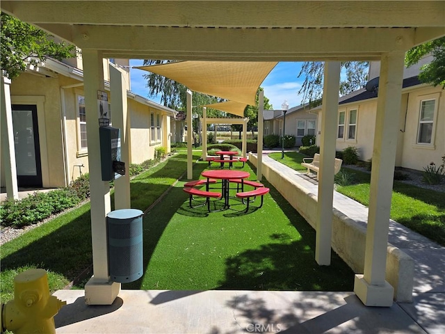 view of community with a lawn