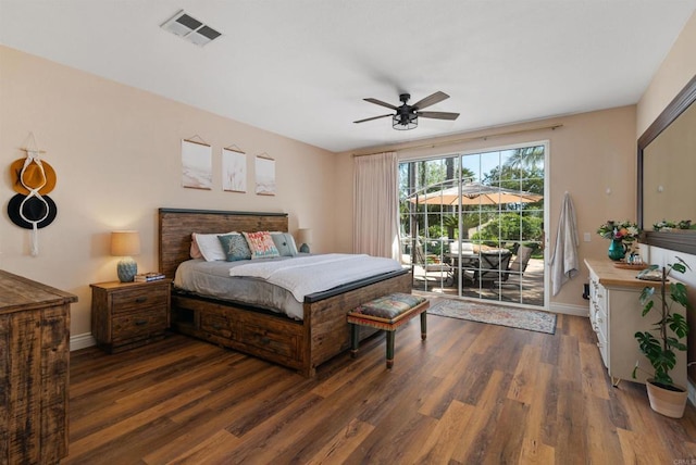 bedroom with a ceiling fan, baseboards, visible vents, access to outside, and wood finished floors