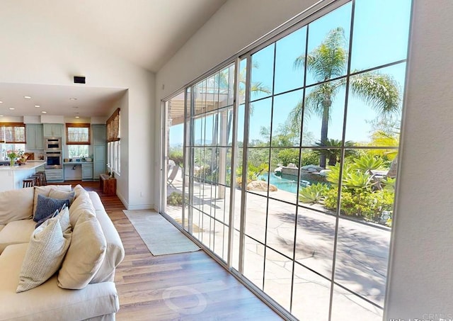 2034 Ridgecrest Pl, Escondido, CA 92029 - entryway with light wood-style flooring, lofted ceiling, baseboards, and recessed lighting