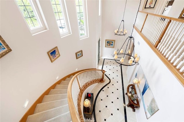 6312 Camino Marinero, San Clemente, CA 92673 - staircase featuring a chandelier and a towering ceiling