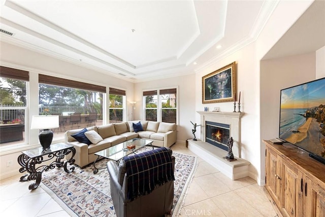 6312 Camino Marinero, San Clemente, CA 92673 - living area featuring a raised ceiling, light tile patterned floors, a glass covered fireplace, and crown molding