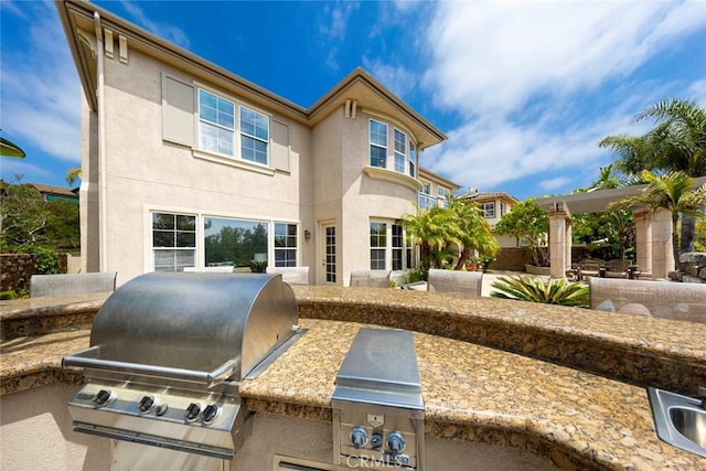 6312 Camino Marinero, San Clemente, CA 92673 - rear view of property featuring exterior kitchen and stucco siding