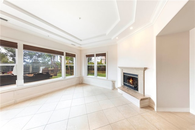 6312 Camino Marinero, San Clemente, CA 92673 - unfurnished living room featuring a tray ceiling, ornamental molding, a high end fireplace, and tile patterned floors