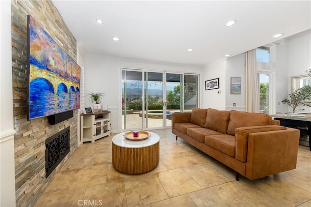 5530 Van Gogh Way, Yorba Linda, CA 92887 - living area with a large fireplace, crown molding, and recessed lighting