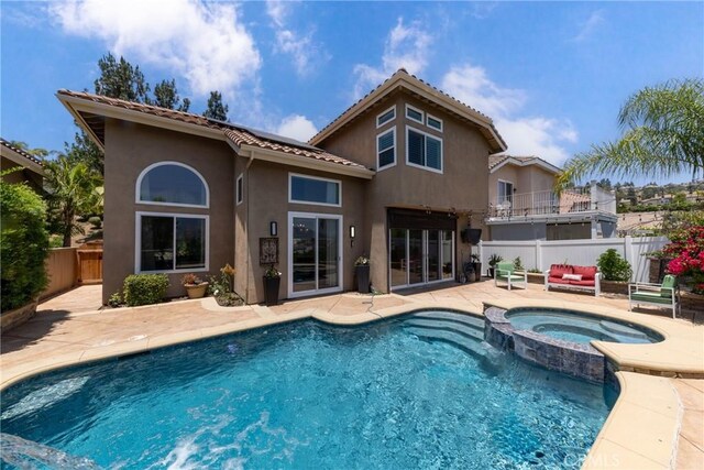 5530 Van Gogh Way, Yorba Linda, CA 92887 - rear view of property with an outdoor hangout area, a patio, stucco siding, a tile roof, and a fenced backyard