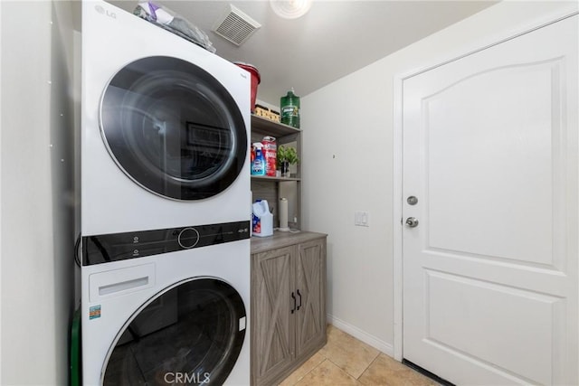 5530 Van Gogh Way, Yorba Linda, CA 92887 - laundry room featuring stacked washing machine and dryer and baseboards