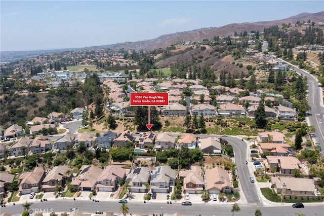 5530 Van Gogh Way, Yorba Linda, CA 92887 - aerial view of property and surrounding area featuring mountains and nearby suburban area