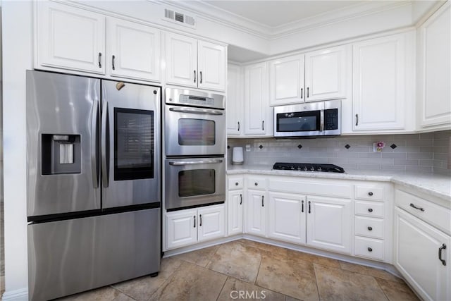 5530 Van Gogh Way, Yorba Linda, CA 92887 - kitchen featuring stainless steel appliances, crown molding, white cabinets, decorative backsplash, and light stone counters