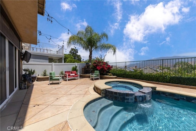 5530 Van Gogh Way, Yorba Linda, CA 92887 - view of pool featuring a patio area, a fenced backyard, a pool with connected hot tub, and a mountain view