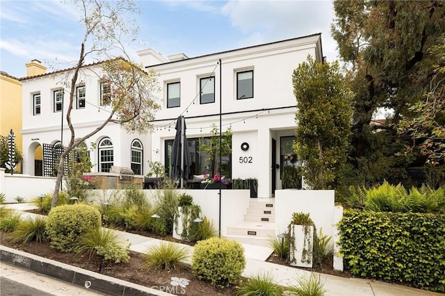 view of front of home featuring stucco siding