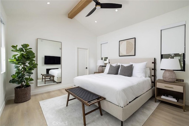 bedroom with a ceiling fan, recessed lighting, baseboards, light wood-type flooring, and vaulted ceiling with beams