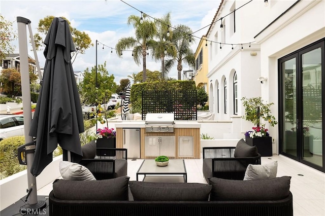 view of patio featuring a grill