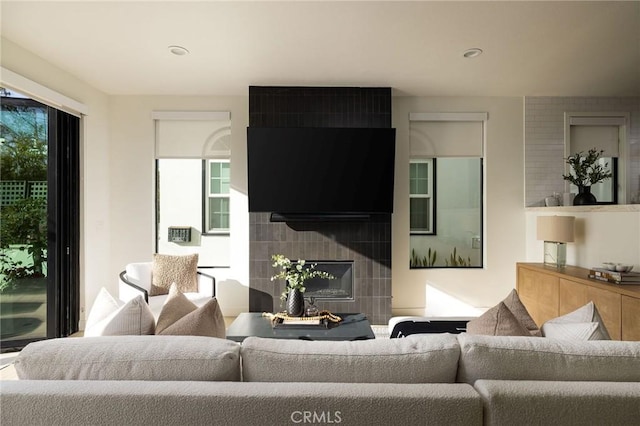 502 Jasmine Ave Unit A, Corona Del Mar, CA 92625 - living area with plenty of natural light and a tiled fireplace