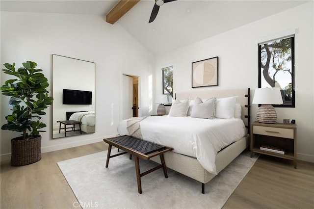 502 Jasmine Ave Unit A, Corona Del Mar, CA 92625 - bedroom with beamed ceiling, light wood-type flooring, baseboards, ceiling fan, and high vaulted ceiling
