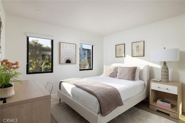 502 Jasmine Ave Unit A, Corona Del Mar, CA 92625 - bedroom featuring wood finished floors and baseboards