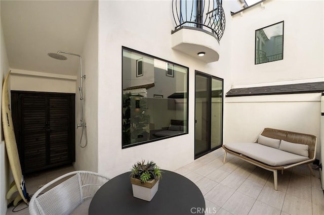 502 Jasmine Ave Unit A, Corona Del Mar, CA 92625 - view of patio with a balcony and outdoor dining area