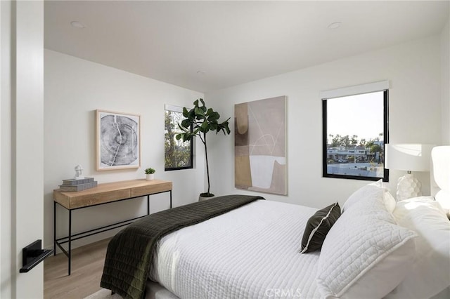 502 Jasmine Ave Unit A, Corona Del Mar, CA 92625 - bedroom featuring light wood-style flooring