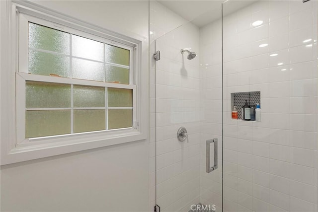 full bathroom with a stall shower