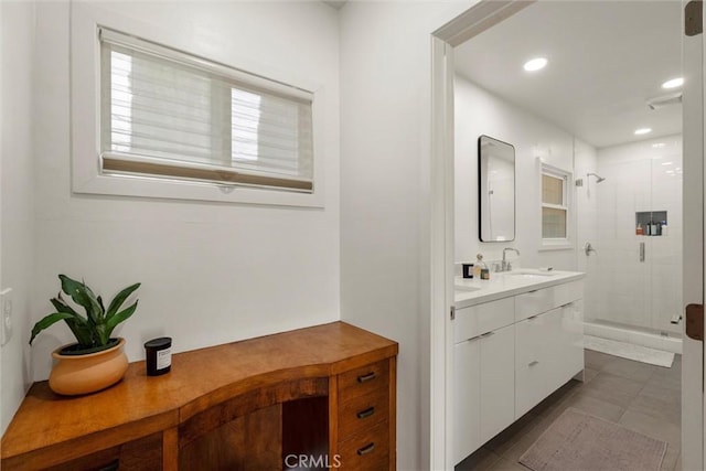 bathroom featuring vanity, recessed lighting, a shower stall, and tile patterned floors