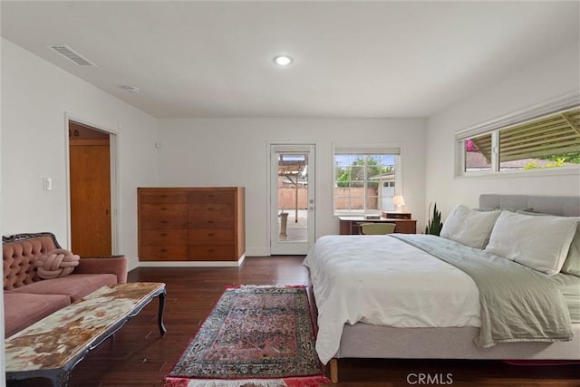bedroom featuring visible vents, baseboards, dark wood-type flooring, access to outside, and recessed lighting