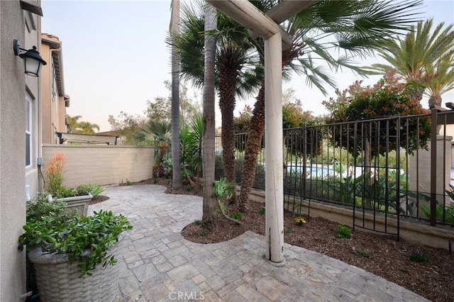 view of patio with fence