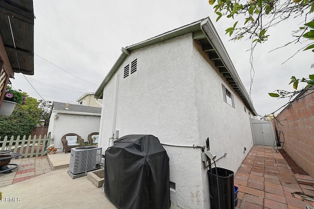 2030 Lomita Park Pl, Lomita, CA 90717 - back of property with central AC, a patio area, stucco siding, and fence