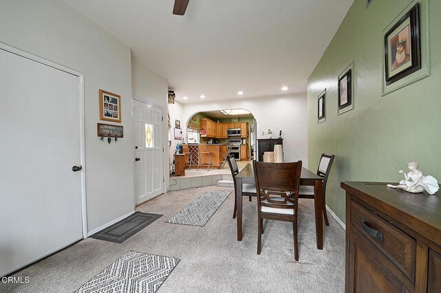 2030 Lomita Park Pl, Lomita, CA 90717 - dining area featuring a ceiling fan, baseboards, arched walkways, light colored carpet, and recessed lighting
