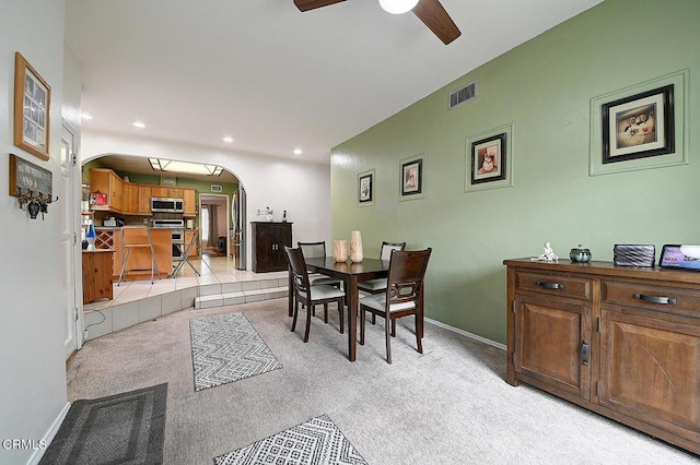 2030 Lomita Park Pl, Lomita, CA 90717 - dining space with light colored carpet, visible vents, recessed lighting, ceiling fan, and arched walkways