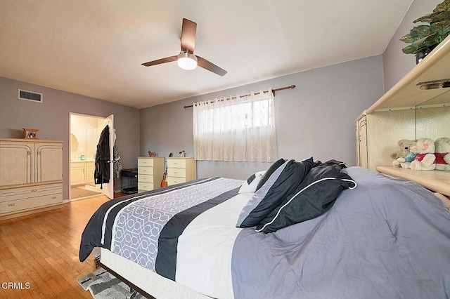 2030 Lomita Park Pl, Lomita, CA 90717 - bedroom featuring ensuite bathroom, visible vents, light wood-style flooring, and a ceiling fan
