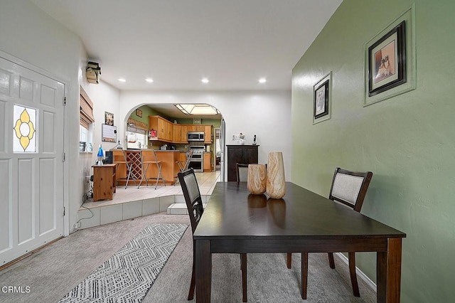 2030 Lomita Park Pl, Lomita, CA 90717 - dining area with arched walkways, light carpet, and recessed lighting