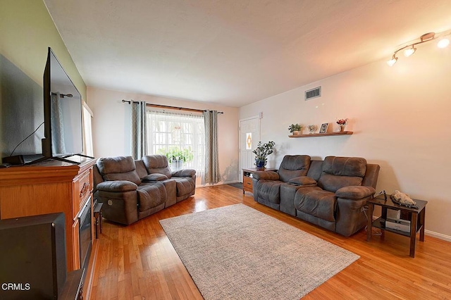 2030 Lomita Park Pl, Lomita, CA 90717 - living room with light wood-style flooring and baseboards