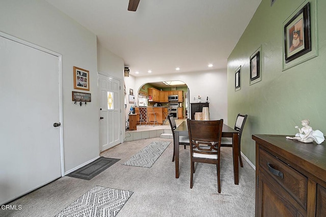 2030 Lomita Park Pl, Lomita, CA 90717 - dining area featuring light carpet, arched walkways, recessed lighting, and ceiling fan