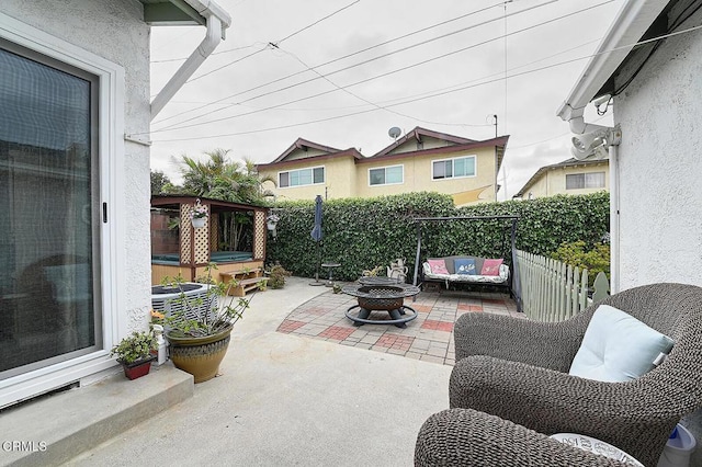 2030 Lomita Park Pl, Lomita, CA 90717 - view of patio / terrace with a hot tub and a fire pit
