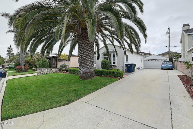 2030 Lomita Park Pl, Lomita, CA 90717 - view of front facade featuring a front lawn, a garage, an outbuilding, and stucco siding