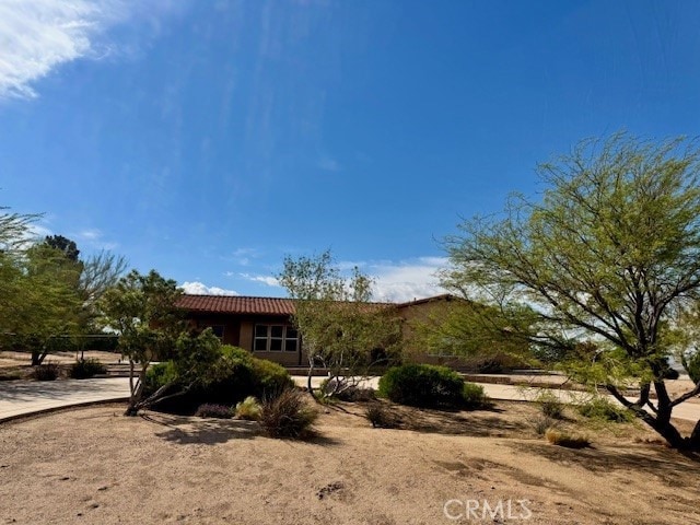 view of front of house with a tile roof