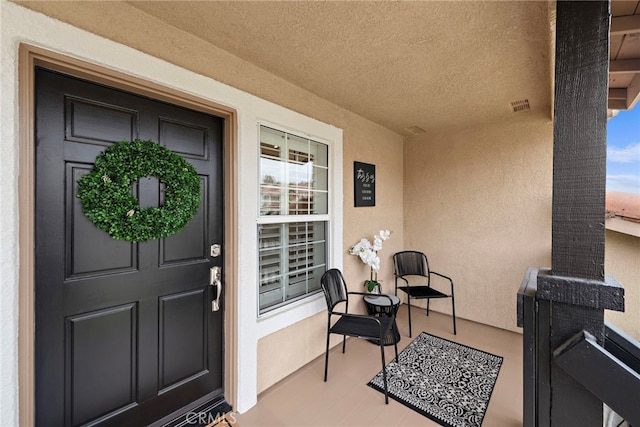 30 Calle Estero, Rancho Santa Margarita, CA 92688 - property entrance with stucco siding and covered porch