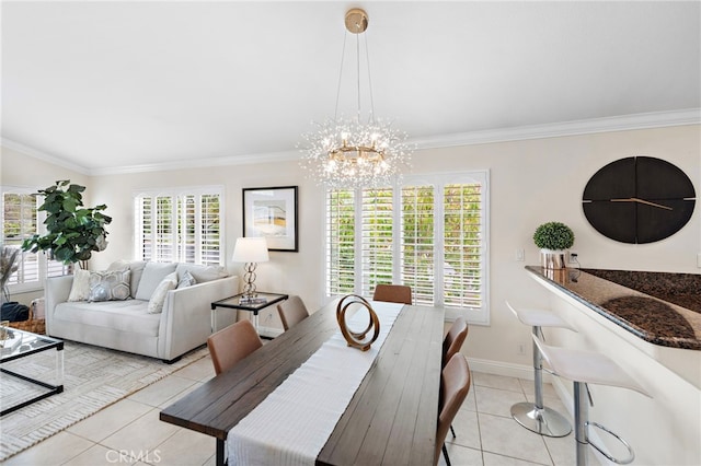 30 Calle Estero, Rancho Santa Margarita, CA 92688 - dining room with light tile patterned floors, plenty of natural light, crown molding, a chandelier, and baseboards