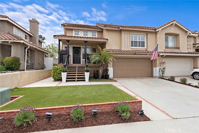 30 Calle Estero, Rancho Santa Margarita, CA 92688 - view of front of house featuring stucco siding, driveway, a garage, and a front lawn