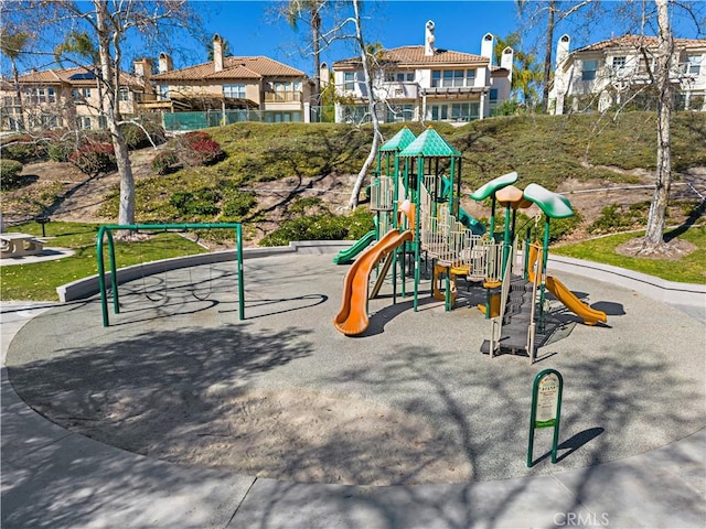 30 Calle Estero, Rancho Santa Margarita, CA 92688 - community play area featuring a residential view