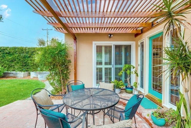 view of patio / terrace featuring outdoor dining space and a pergola