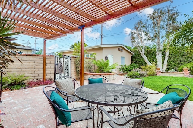 view of patio / terrace with outdoor dining space, a pergola, and fence
