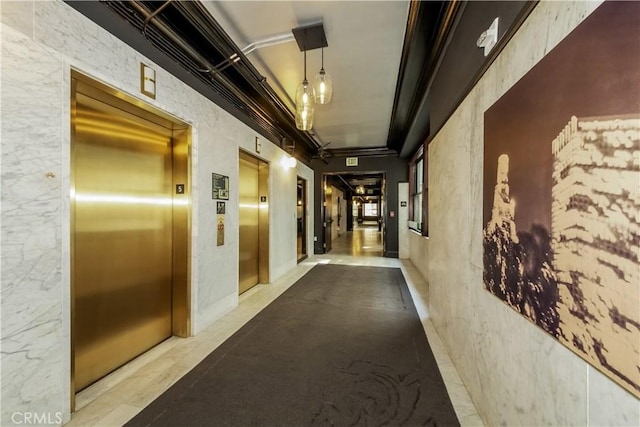 hallway featuring elevator