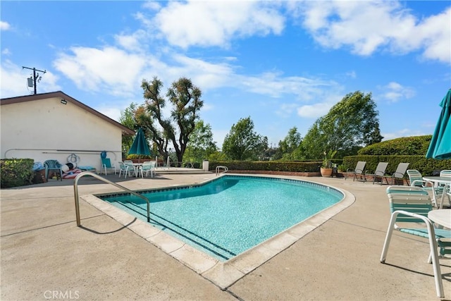 pool with a patio