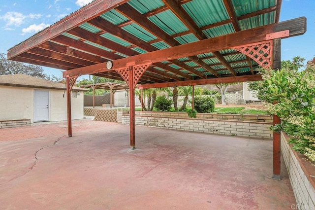 view of patio featuring a carport